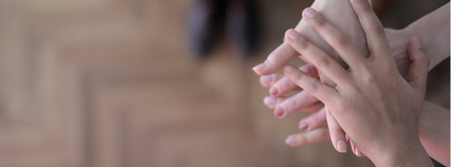 3 of 5, hands joined together