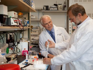 Dr. Mobley and Dr. Belichenko in the lab